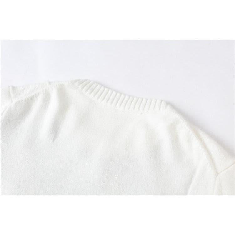 white embroidered sweater
