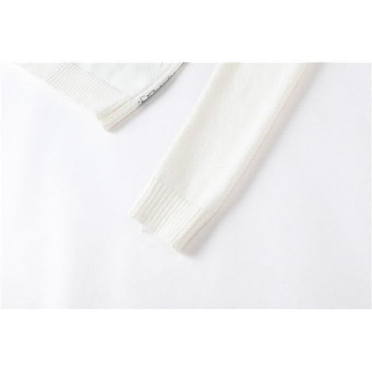 white embroidered sweater