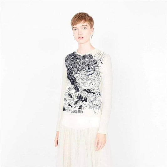white embroidered sweater